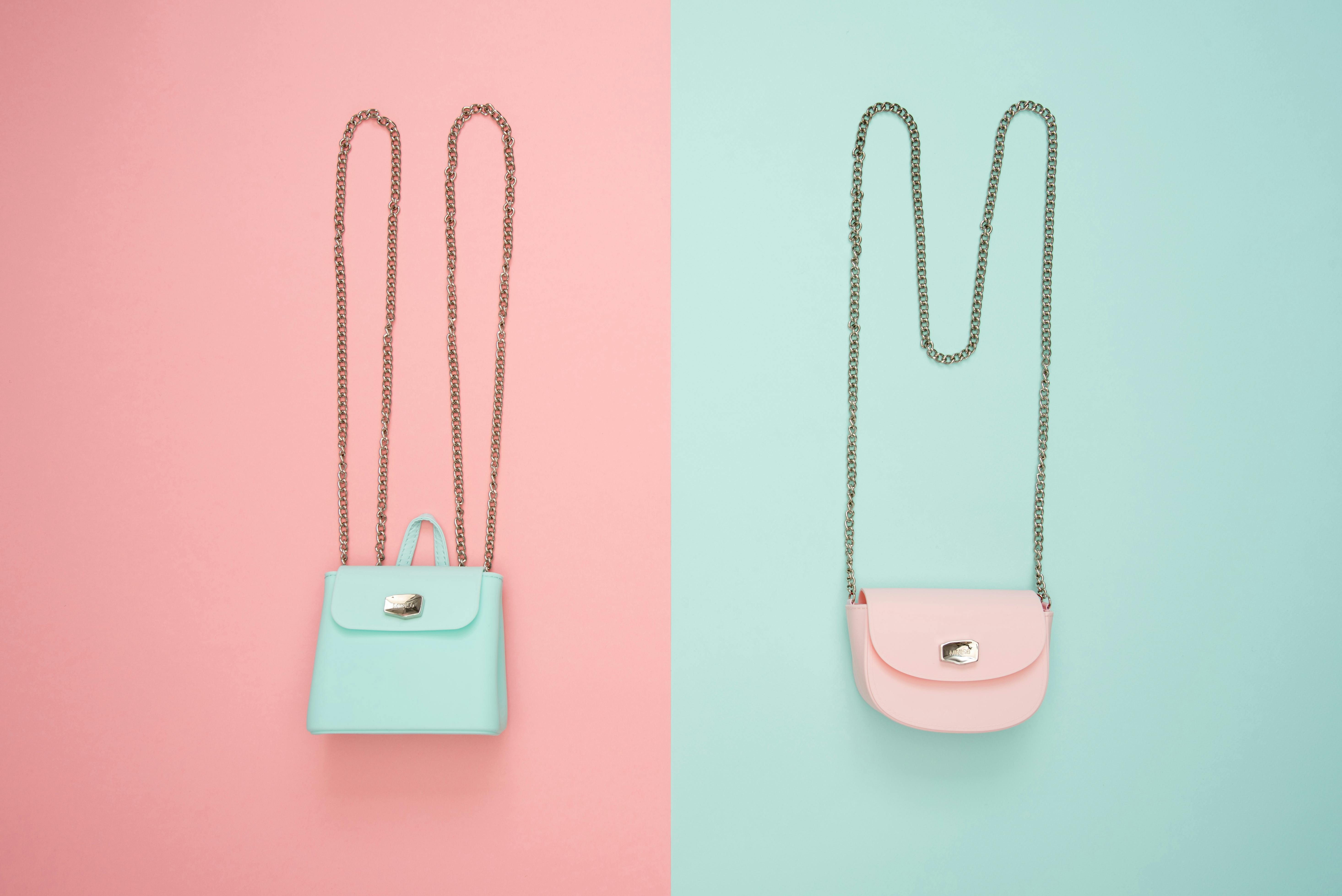 Photo of Two Teal and Pink Leather Crossbody Bags