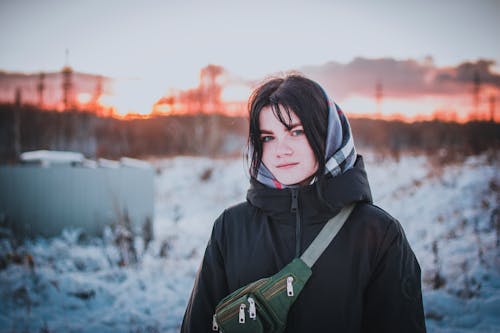 Shallow Focus of a Girl Wearing Her Black Winter Coat