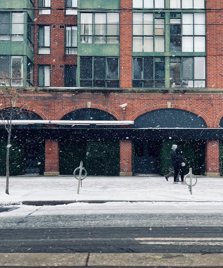 City Street With Brick Building In Snow