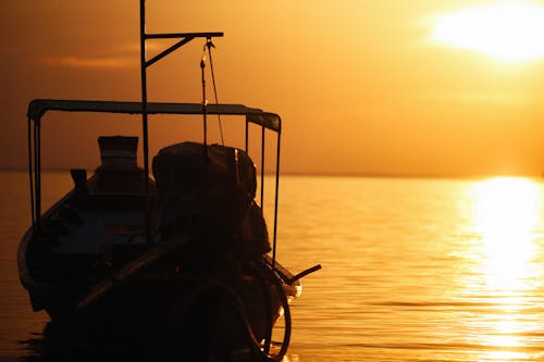 Δωρεάν στοκ φωτογραφιών με ακτή, βάρκα, δύση του ηλίου