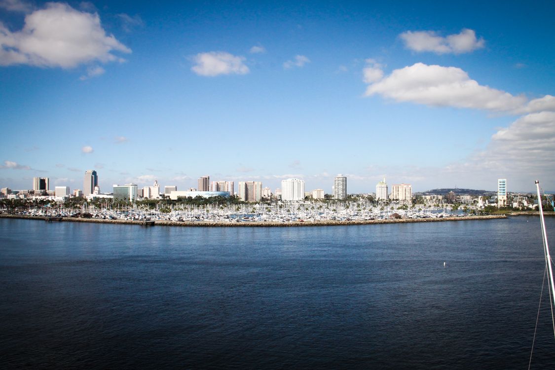 Free Body of Water With Buildings on Side Stock Photo