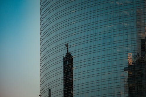 Foto profissional grátis de arquitetura, arranha-céu, artigos de vidro