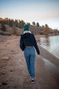 Girl Walking on the Beach