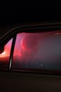 Woman in Black Jacket Sitting in the Car
