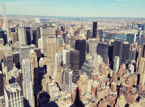 Free Breathtaking aerial view of New York City's modern skyline with iconic skyscrapers. Stock Photo