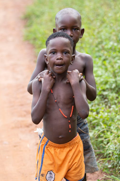 Young Boys Holding Each Other