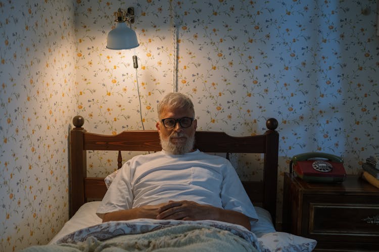 Elderly Man In Bed