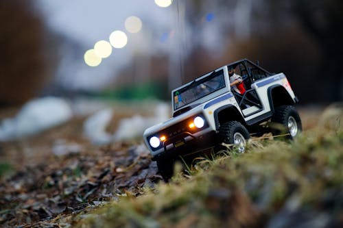 Close-Up Shot of a Toy Car on a Grass