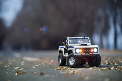 Close-Up Shot of a Toy Car on the Road