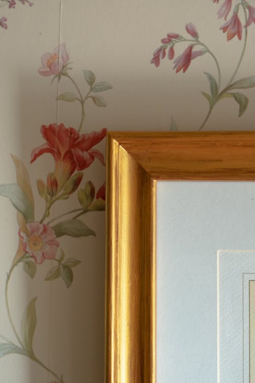 A Selective Shot of Part of a Frame on Bedroom Wallpaper 