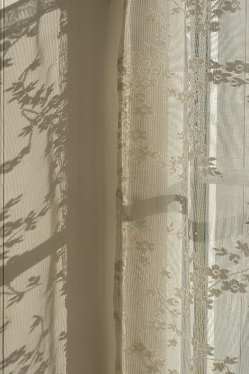 Close-up View of Curtains with Floral Theme
