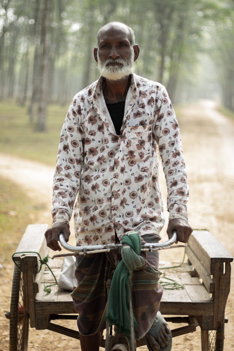 Man On A Bicycle With A Trailer 