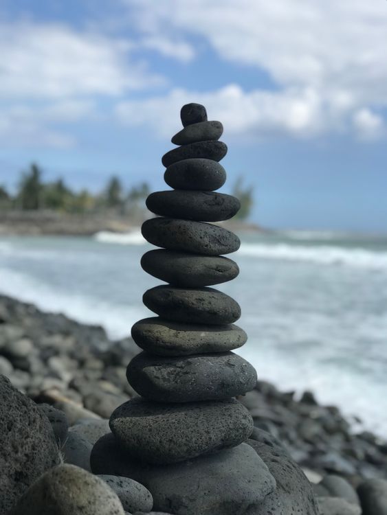 Stacking Oval Rocks Stack of Oval Rocks on Beach · Free Stock Photo