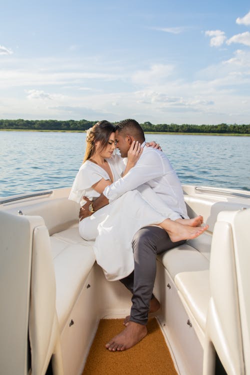 Free Intimate Couple on White Boat Stock Photo