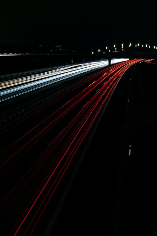 Free Time-Lapse Photography of Cars on Road during Nighttime Stock Photo
