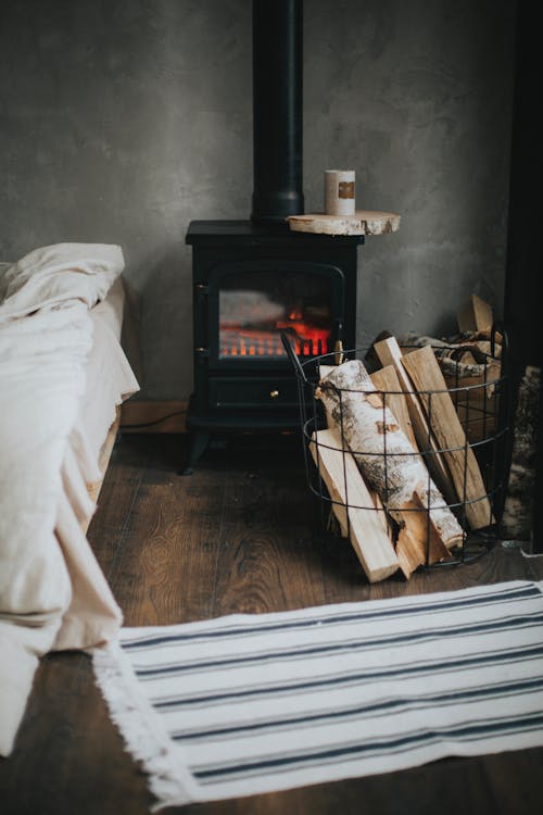 Kostenloses Stock Foto zu brennhölzer, gemütlich, kamin