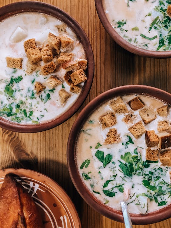Free Flatlay of Yummy Soups in Bowls Stock Photo