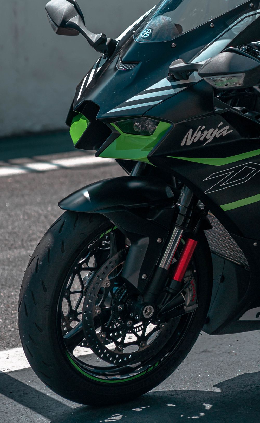 Detailed view of a supercharged sport bike on a track