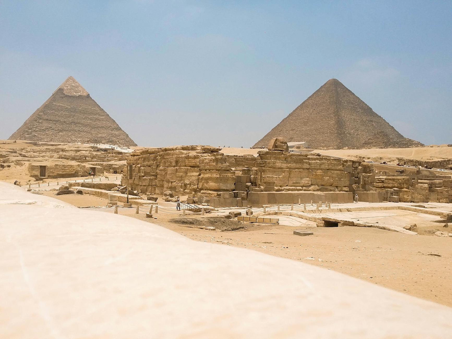 Breathtaking view of the iconic pyramids in Giza, showcasing ancient architectural marvels.