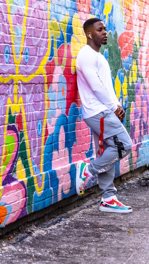 Man Posing Against Colorful Wall