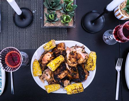 Delicious grilled chicken with corn, set for a charming dinner.