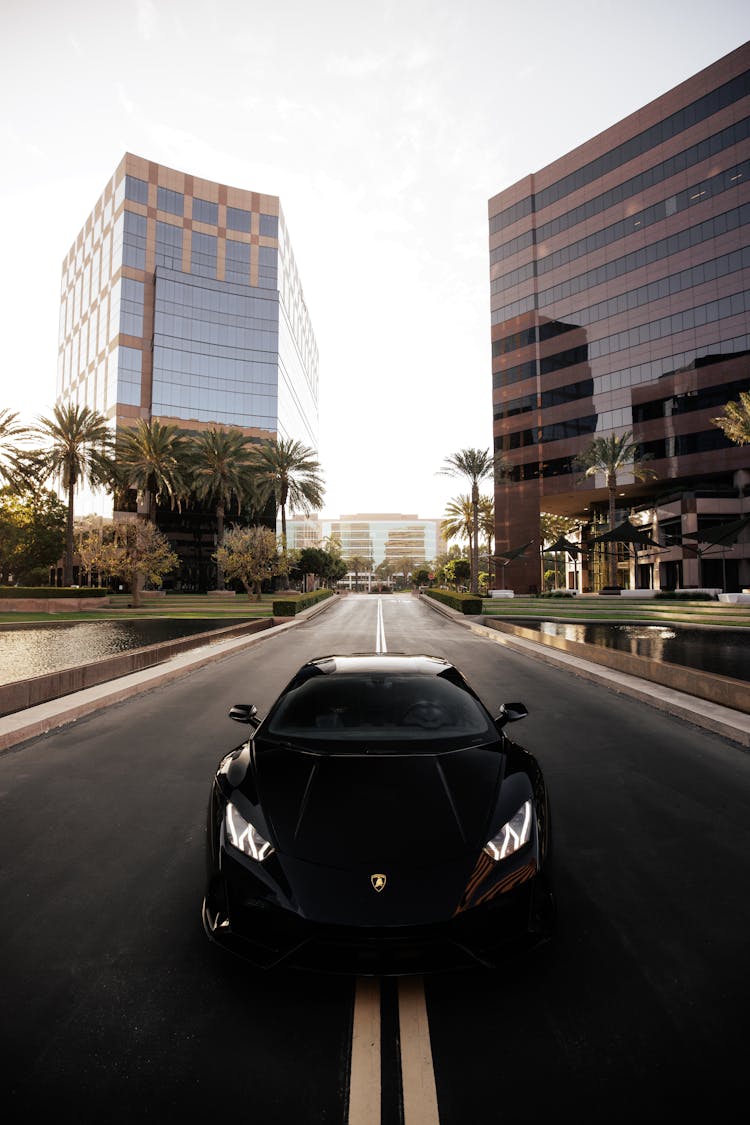 A Black Sports Car On The Street