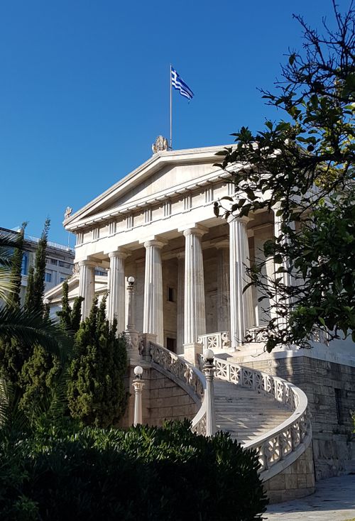 Free Elegant neoclassical architecture with columns in Athens, Greece. Iconic historical site under clear sky. Stock Photo