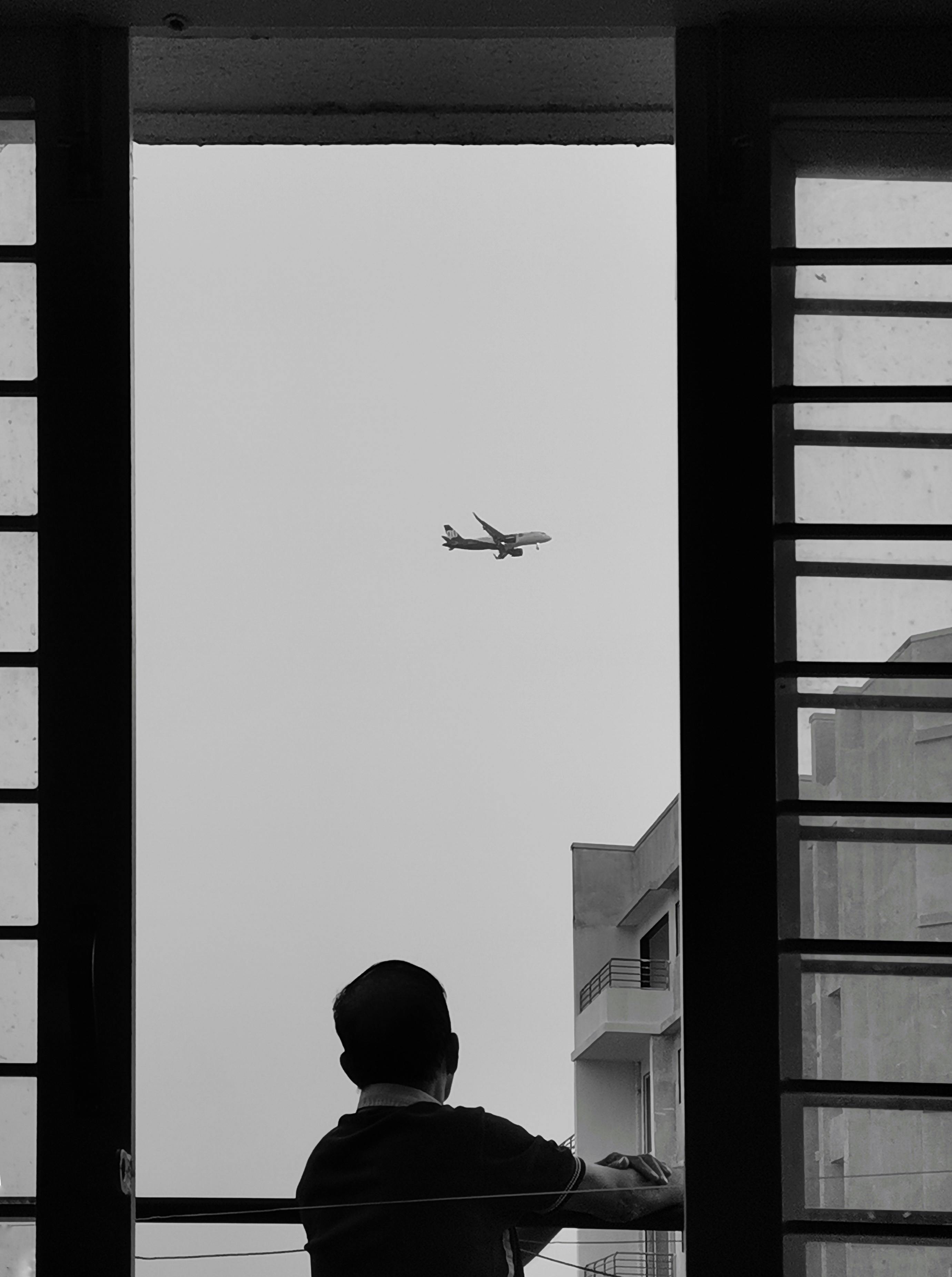 HD wallpaper: Greyscale Photo of Man Looking Through Window, black