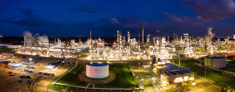 Refinery and fuel terminal lit at dusk