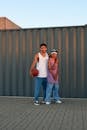 Stylihs Men in Tank Top and Denim Pants
