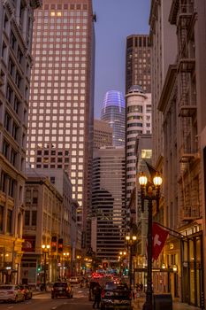 Captivating twilight view of San Francisco's bustling downtown with iconic skyscrapers.