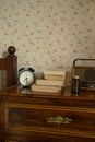 Retro Alarm Clock and Radio on Chest of Drawers