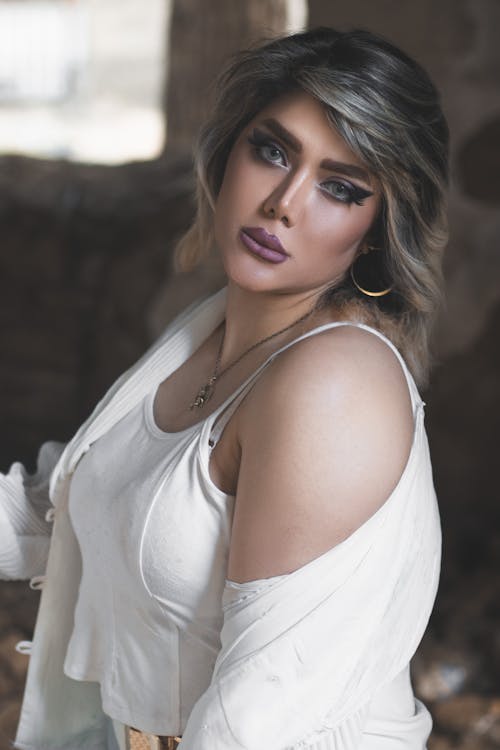 Woman in White Tank Top with Makeup