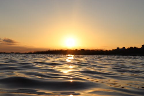 Gratis stockfoto met gebied met water, gouden uur, hemel