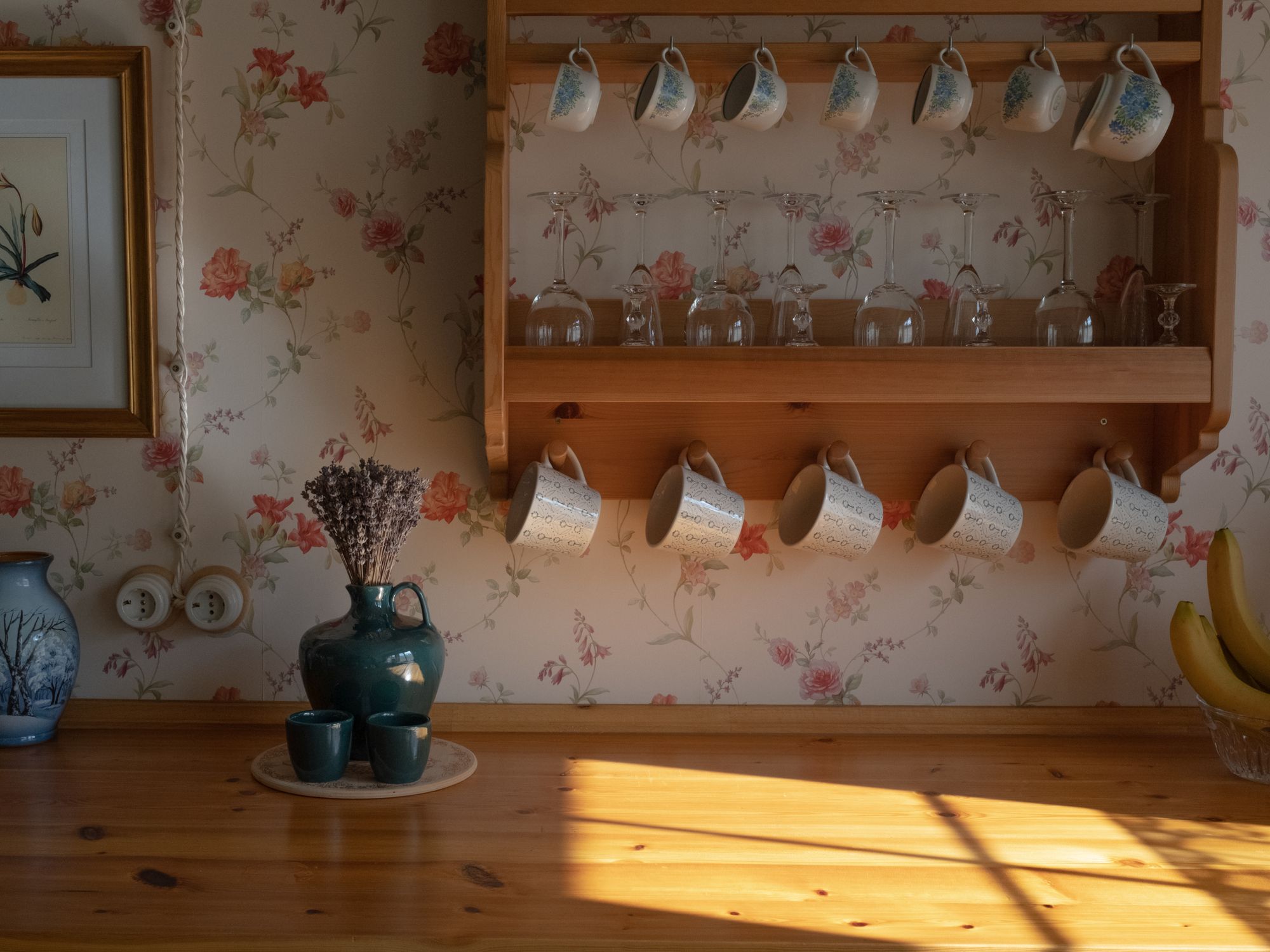Wallpapering in North End, Bexley — decorator hanging pattern-matched wallpaper