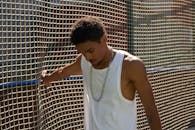 A Man Touching the Net