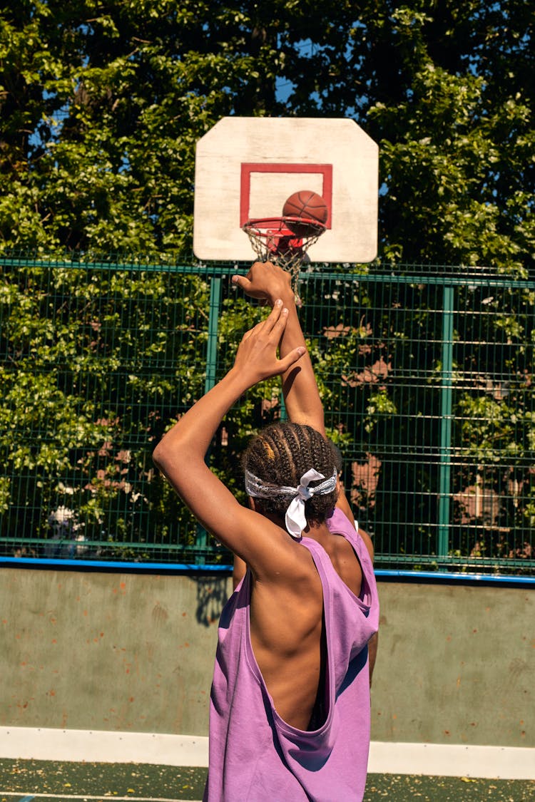 A Man Playing Basketball