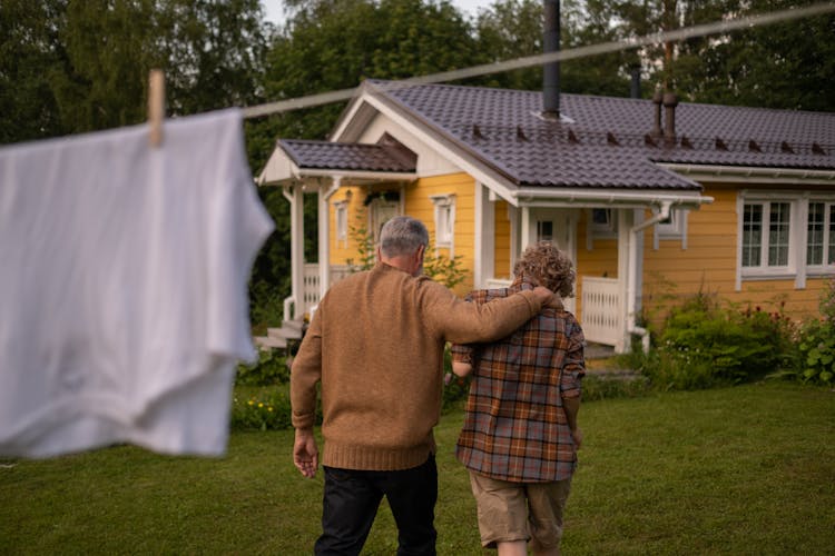 Grandfather And Grandson Walking Home