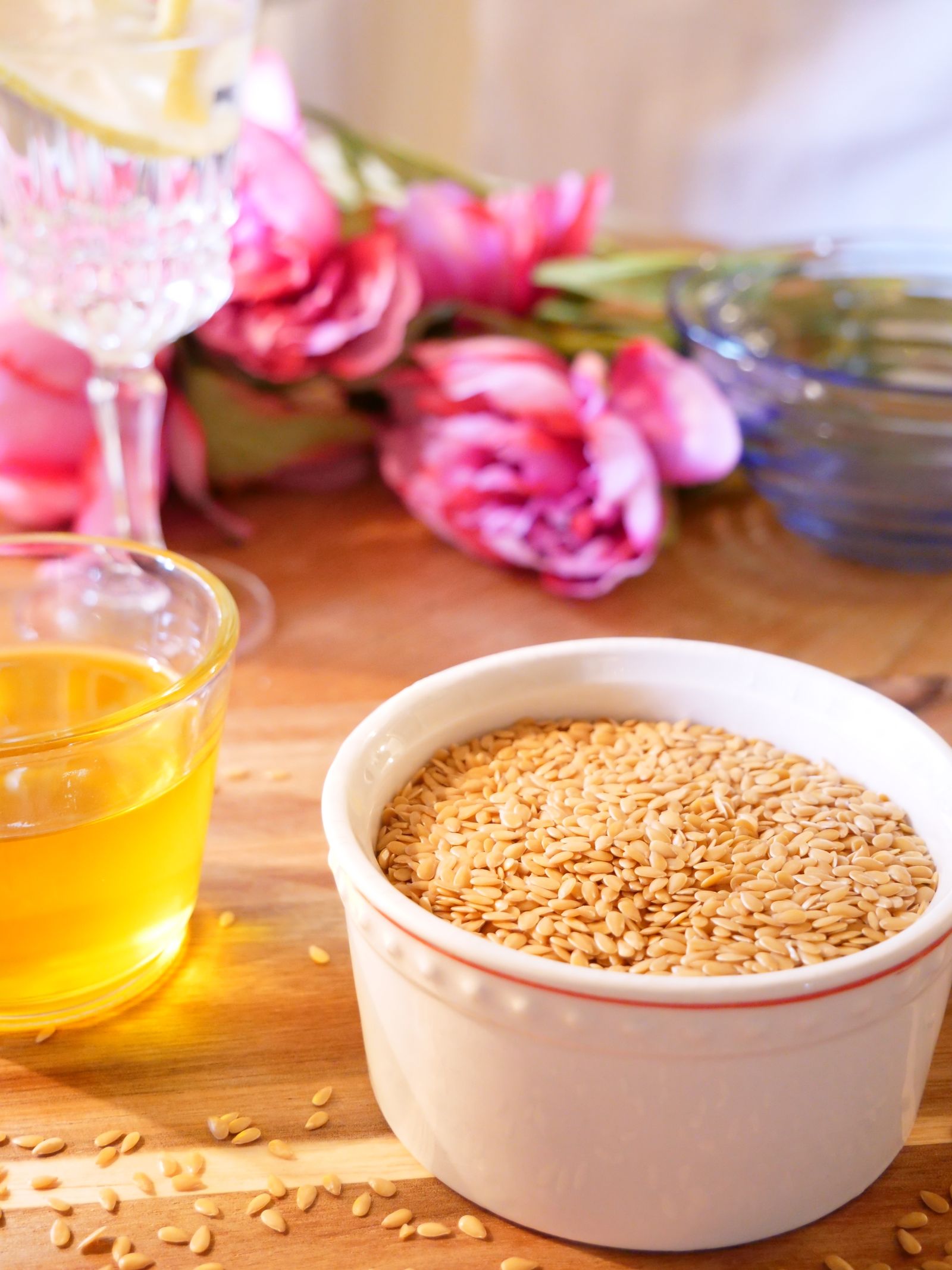 Sesame oil bottle and sesame seeds