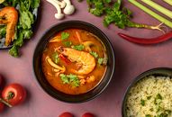 Soup With Vegetables and Shrimp in Brown Ceramic Bowl