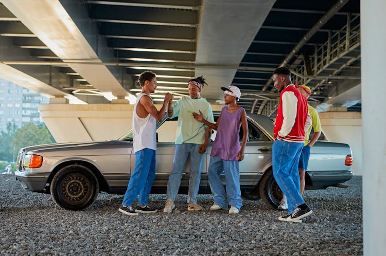 Group Of Men Greeting Each Other