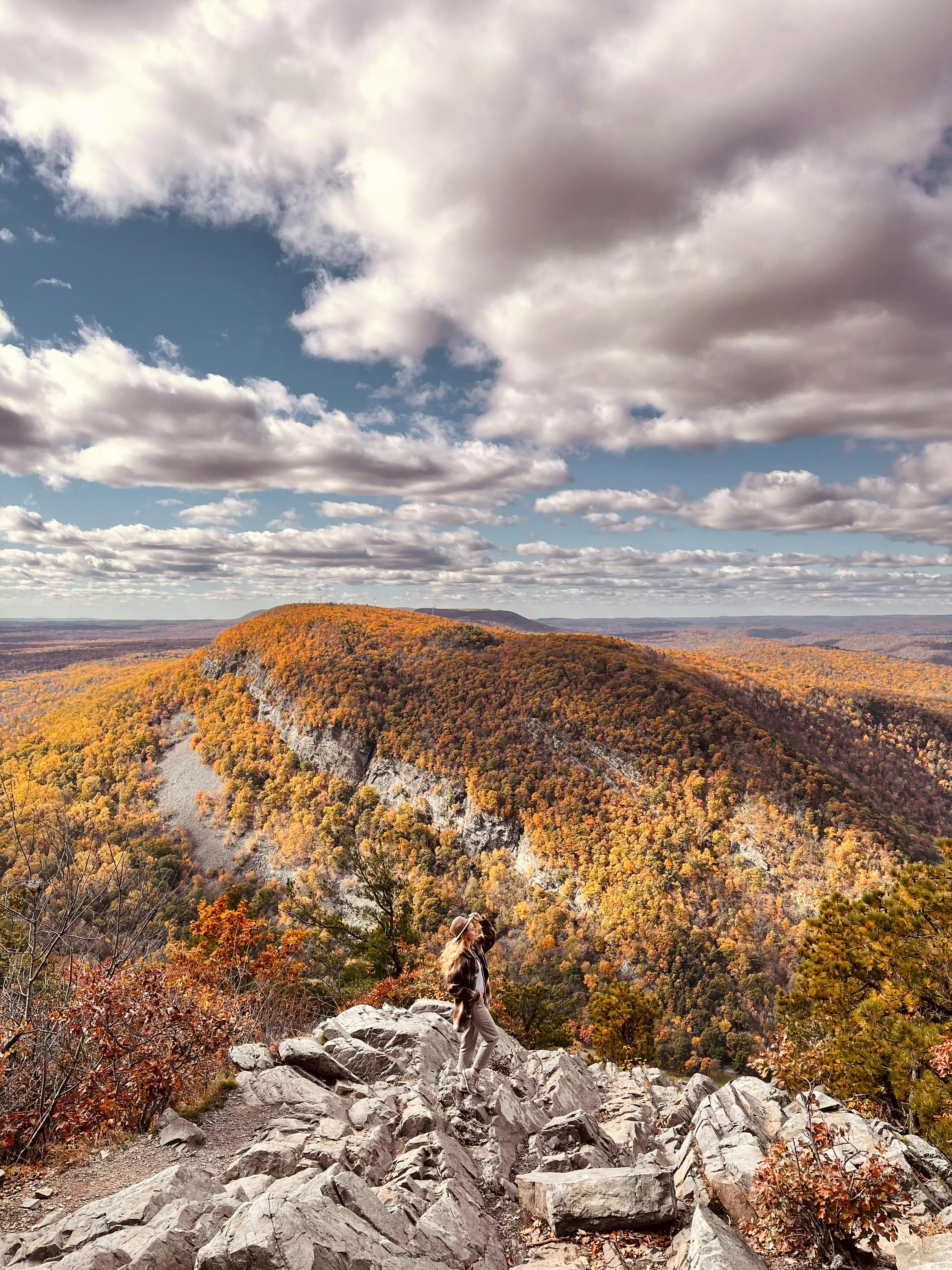 Man Sitting on a Rock in the Mountains · Free Stock Photo