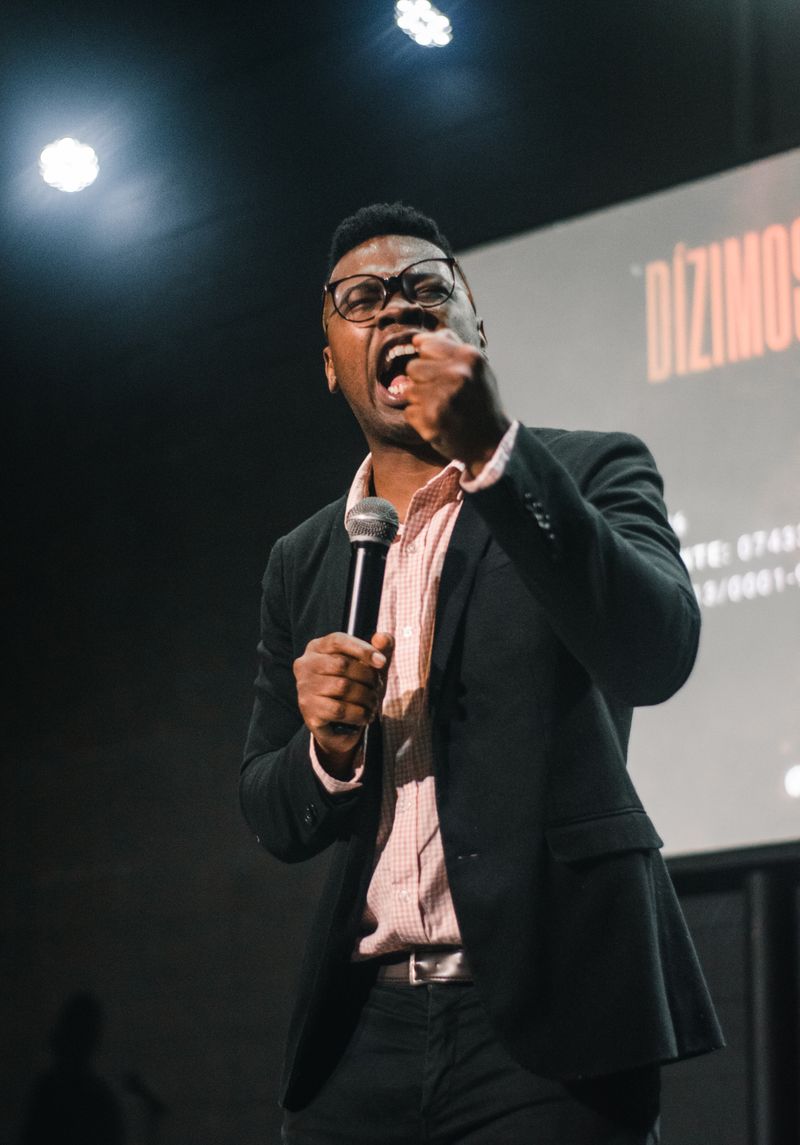 Photographer documenting a keynote speaker at a Melbourne conference venue