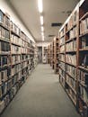 Library Shelves Stacked with Books