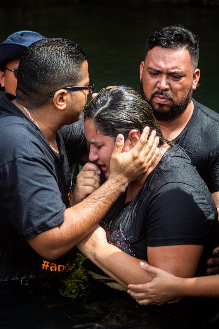 A Man Comforting A Crying Woman