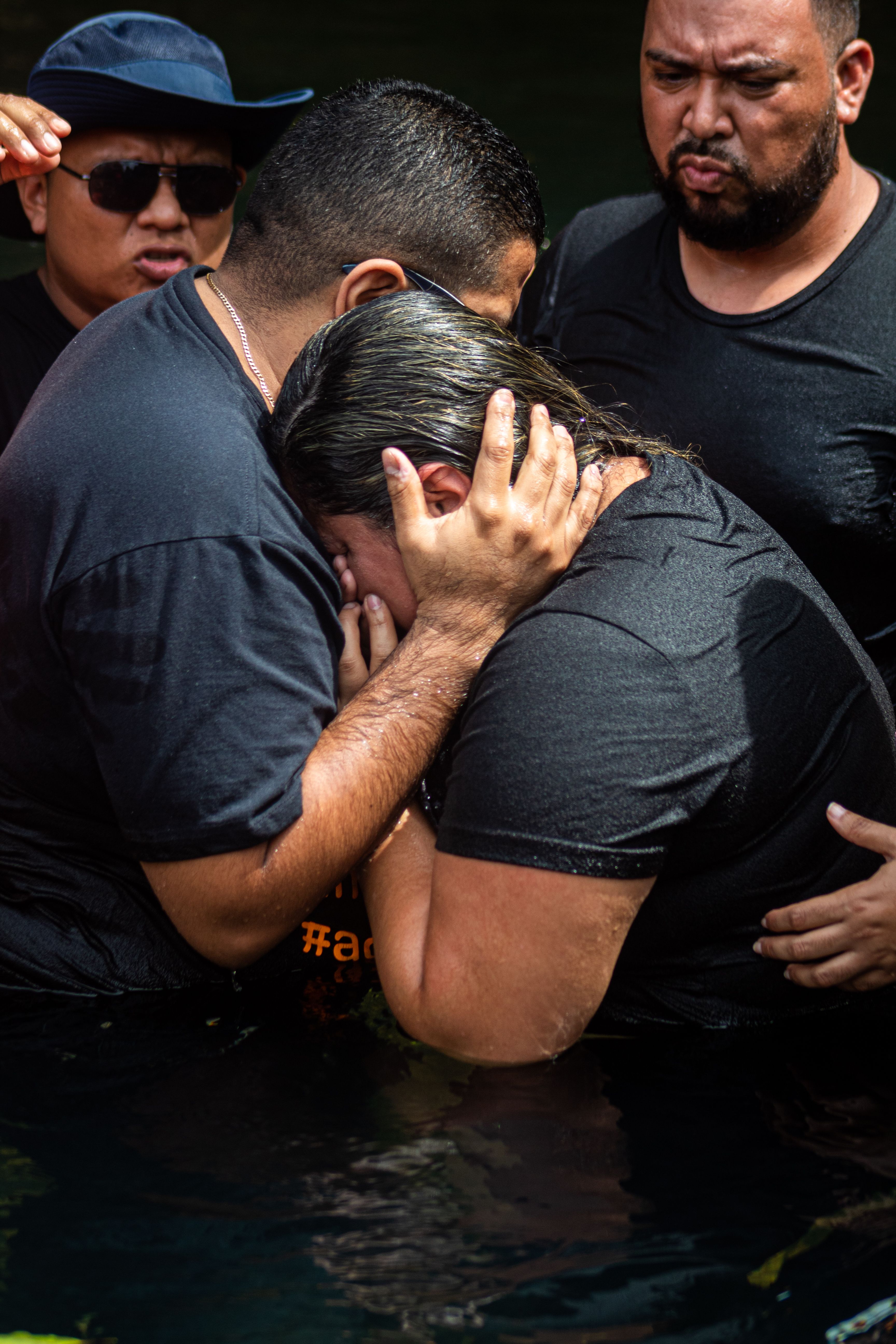 An Emotional Woman Crying on a Man's Shoulder · Free Stock Photo
