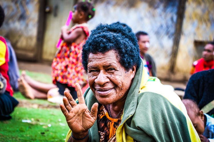 Elderly Woman Waving Her Hand