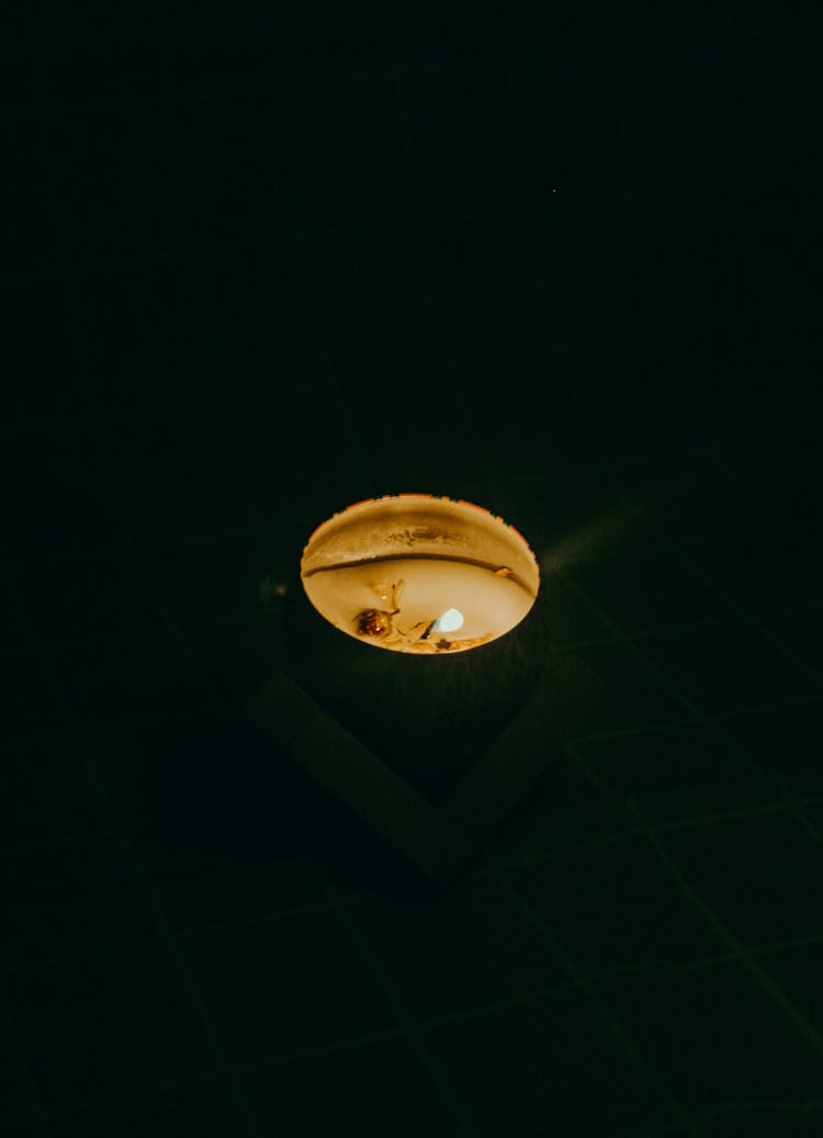 A Lighted Candle In The Dark