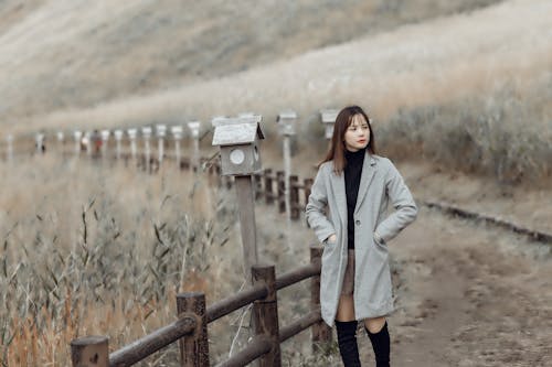 Beautiful Woman in Gray Coat