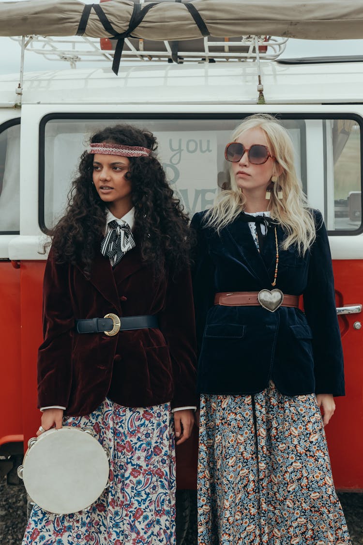 Women Standing Beside A Van